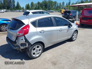 2016 Ford Fiesta SE z VIN 3FADP4EJ0GM122392, wystawiony jako IAAI lot #42364419 z przebiegiem 98 357 mil mil oraz . Historia ofert i sprzedaży dostępna na DreamBid. Obrazek 4.