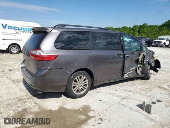 2015 Toyota Sienna XLE with VIN 5TDYK3DC5FS643985, listed as a Copart auction lot 56956505 with 179,131 mi miles and Salvage title. Bid and sale history available at DreamBid. Image 3.