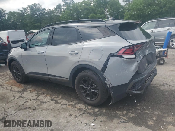 2023 Kia Sportage X-Pro z VIN 5XYK7CAFXPG094501, wystawiony jako Copart lot #56043535 z przebiegiem 19 241 mil mil oraz Szkoda całkowita • Salvage title. Historia ofert i sprzedaży dostępna na DreamBid. Obrazek 2.