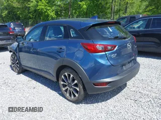 2019 Mazda CX-3 Touring z VIN JM1DKFC72K1459583, wystawiony jako IAAI lot #42380694 z przebiegiem 13 846 mil mil oraz . Historia ofert i sprzedaży dostępna na DreamBid. Obrazek 3.