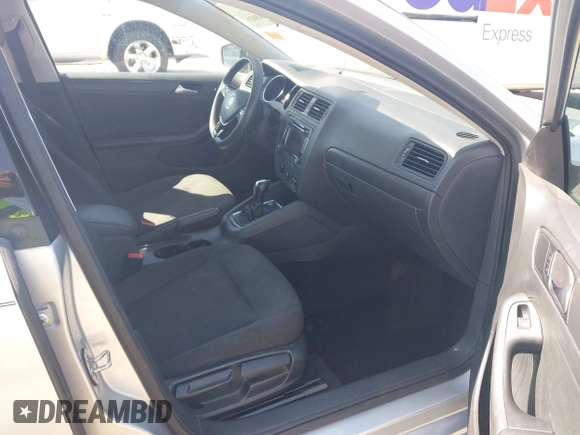 2015 Volkswagen Jetta Sedan 2.0L S with VIN 3VW2K7AJXFM423061, listed as a IAAI auction lot 42083522 with 161,028 mi miles. Bid and sale history available at carsss.com. Image 5.