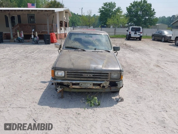 1988 Toyota Pickup with VIN JT4RN50R4J5146510, listed as a IAAI auction lot 42092308 with 288,420 mi miles and . Bid and sale history available at DreamBid. Image 6.