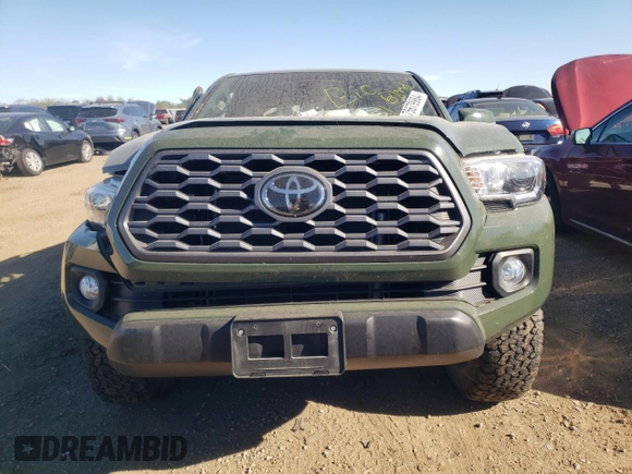 2021 Toyota Tacoma SR z VIN 3TYSZ5AN0MT035649, wystawiony jako Copart lot #75679984 z przebiegiem Nie podano mil oraz Szkoda całkowita • Salvage title. Historia ofert i sprzedaży dostępna na DreamBid. Obrazek 5.