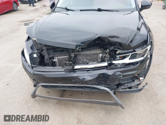 2021 Volkswagen Tiguan S with VIN 3VV1B7AX4MM025586, listed as a IAAI auction lot 41889996 with 21,777 mi miles and . Bid and sale history available at DreamBid. Image 6.