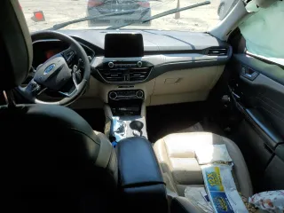 2021 Ford Escape SEL z VIN 1FMCU0H63MUB08827, wystawiony jako Copart lot #53535125 z przebiegiem Nie podano mil oraz Szkoda całkowita • Salvage title. Historia ofert i sprzedaży dostępna na DreamBid. Obrazek 8.