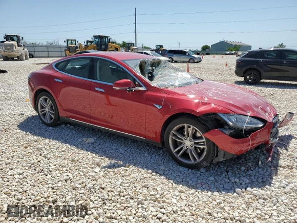2013 Tesla Model S with VIN 5YJSA1CN1DFP26864, listed as a Copart auction lot 52029485 with 63,260 mi miles and Salvage Title. Bid and sale history available at DreamBid. Image 4.