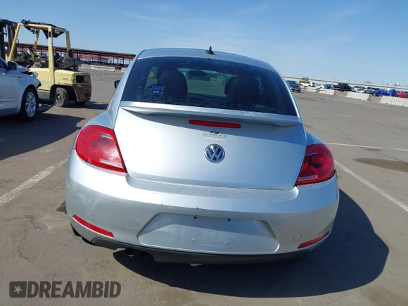 2013 Volkswagen Beetle 2.5L w/Sun/Sound/Nav with VIN 3VWJX7AT5DM606119, listed as a IAAI auction lot 41970253 with 81,004 mi miles and . Bid and sale history available at DreamBid. Image 17.