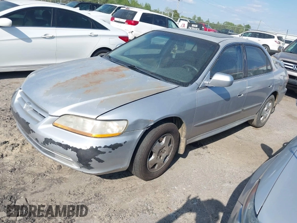 2001 Honda Accord EX z VIN 1HGCG16571A002293, wystawiony jako IAAI lot #42081307 z przebiegiem 336 808 mil mil oraz . Historia ofert i sprzedaży dostępna na DreamBid. Obrazek 2.