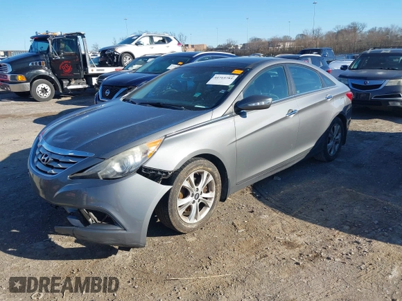 2013 Hyundai Sonata Limited with VIN 5NPEC4ACXDH775136, listed as a IAAI auction lot 41715781 with 214,693 mi miles and . Bid and sale history available at carsss.com. Image 2.