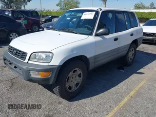 1999 Toyota RAV4 with VIN JT3GP10V2X7064915, listed as a IAAI auction lot 41998544 with 302,351 mi miles and . Bid and sale history available at DreamBid. Image 2.