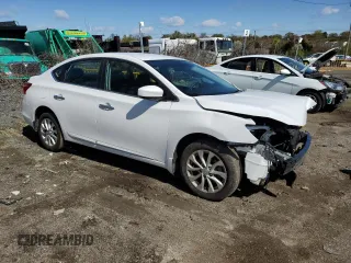 2018 Nissan Sentra SV z VIN 3N1AB7AP2JY262454, wystawiony jako Copart lot #52227965 z przebiegiem 17 091 mil mil oraz Szkoda całkowita • Salvage title. Historia ofert i sprzedaży dostępna na DreamBid. Obrazek 4.