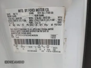 2012 Ford F-150 XL with VIN 1FTFX1CF0CKE40529, listed as a IAAI auction lot 42058990 with 234,032 mi miles. Bid and sale history available at carsss.com. Image 9.
