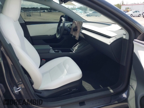 2025 Tesla Model 3 Long Range with VIN 5YJ3E1EA7SF940208, listed as a IAAI auction lot 42433793 with 1,983 mi miles and . Bid and sale history available at DreamBid. Image 5.