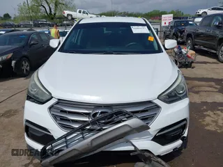 2017 Hyundai Santa Fe 2.4L z VIN 5XYZTDLB3HG439072, wystawiony jako IAAI lot #42061127 z przebiegiem 145 864 mil mil oraz . Historia ofert i sprzedaży dostępna na DreamBid. Obrazek 13.