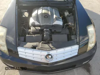 2004 Cadillac XLR z VIN 1G6YV34A945601976, wystawiony jako Copart lot #83062774 z przebiegiem 97 920 mil mil oraz Tytuł czysty. Historia ofert i sprzedaży dostępna na DreamBid. Obrazek 11.