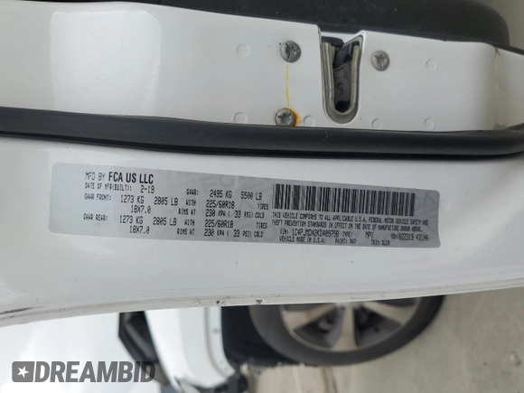 2019 Jeep Cherokee Limited with VIN 1C4PJMDX2KD409798, listed as a Copart auction lot 56913685 with 59,299 mi miles and Salvage title. Bid and sale history available at DreamBid. Image 14.