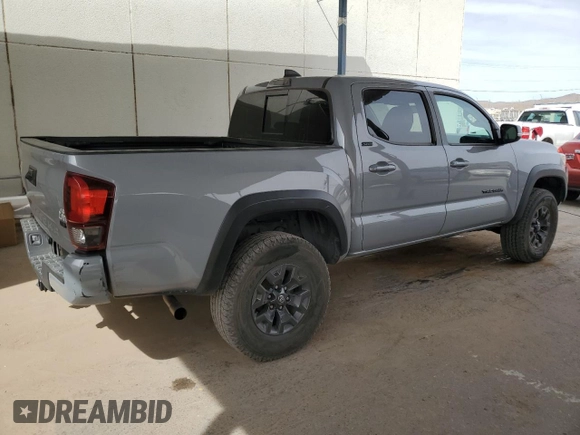 2021 Toyota Tacoma 4WD SR with VIN 5TFCZ5AN8MX282850, listed as a Copart auction lot 50272105 with 31,875 mi miles and Salvage Title. Bid and sale history available at carsss.com. Image 3.