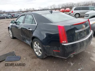 2009 Cadillac CTS AWD z VIN 1G6DG577690116381, wystawiony jako IAAI lot #41944644 z przebiegiem 171 745 mil mil oraz . Historia ofert i sprzedaży dostępna na DreamBid. Obrazek 3.
