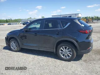 2023 Mazda CX-5 S Carbon Edition z VIN JM3KFBCM3P0264493, wystawiony jako Copart lot #52118475 z przebiegiem 3 195 mil mil oraz Szkoda całkowita • Salvage title. Historia ofert i sprzedaży dostępna na DreamBid. Obrazek 2.