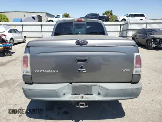 2006 Mitsubishi Raider Duro Cross z VIN 1Z7HC38N36S540424, wystawiony jako Copart lot #61032655 z przebiegiem 285 566 mil mil oraz Czysty tytuł • Clean title. Historia ofert i sprzedaży dostępna na DreamBid. Obrazek 6.