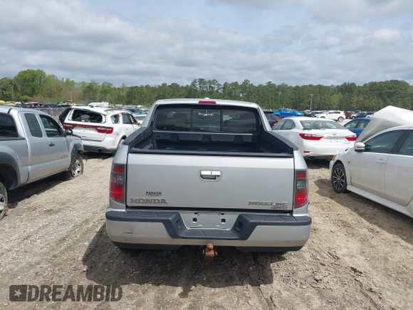 2014 Honda Ridgeline RTL with VIN 5FPYK1F53EB013752, listed as a IAAI auction lot 41886851 with 89,038 mi miles and . Bid and sale history available at DreamBid. Image 16.