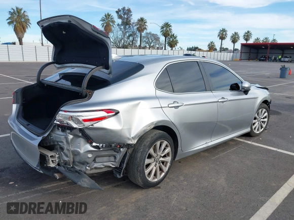2019 Toyota Camry LE with VIN 4T1B11HK7KU803624, listed as a IAAI auction lot 41589107 with 169,863 mi miles and . Bid and sale history available at DreamBid. Image 4.