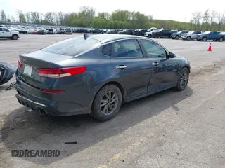 2020 Kia Optima LX with VIN 5XXGT4L3XLG384486, listed as a IAAI auction lot 42157710 with 106,413 mi miles and . Bid and sale history available at DreamBid. Image 4.
