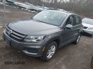 2017 Volkswagen Tiguan S with VIN WVGBV7AX5HK028788, listed as a IAAI auction lot 41699615 with 113,608 mi miles and . Bid and sale history available at DreamBid. Image 2.