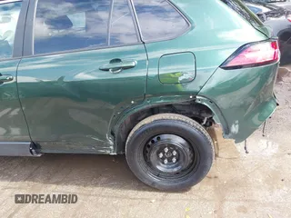 2023 Toyota Corolla Cross XLE z VIN 7MUDAABG1PV075110, wystawiony jako IAAI lot #42802303 z przebiegiem 41 869 mil mil oraz . Historia ofert i sprzedaży dostępna na DreamBid. Obrazek 6.