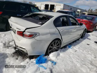 2018 BMW 5 Series M550i xDrive с VIN WBAJB9C59JB050103, выставлен на аукционе Copart как лот 44687215 с пробегом Не указан миль и Списание • Salvage title. История ставок и продаж доступна на DreamBid. Изображение 3.