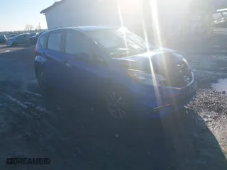 2015 Nissan Versa Note S with VIN 3N1CE2CP2FL357472, listed as a IAAI auction lot 41215110 with 104,091 mi miles. Bid and sale history available at carsss.com. Image 1.