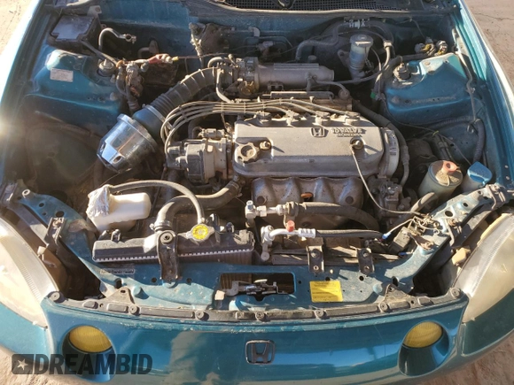 1995 Honda Civic z VIN JHMEG1245SS001206, wystawiony jako Copart lot #77599784 z przebiegiem 197 722 mil mil oraz Szkoda całkowita • Salvage title. Historia ofert i sprzedaży dostępna na DreamBid. Obrazek 11.