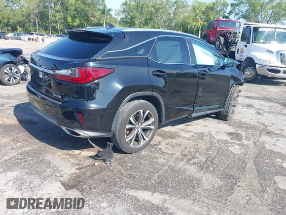 2019 Lexus RX with VIN 2T2ZZMCA4KC129338, listed as a IAAI auction lot 41866980 with 72,265 mi miles. Bid and sale history available at carsss.com. Image 4.