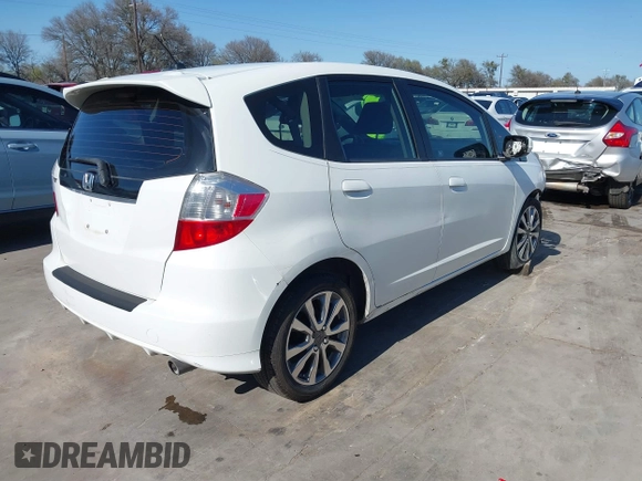 2013 Honda Fit Sport with VIN JHMGE8H54DC059358, listed as a IAAI auction lot 41776717 with 90,595 mi miles. Bid and sale history available at carsss.com. Image 4.