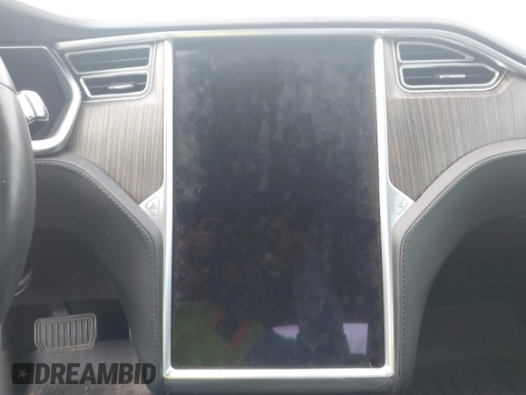 2013 Tesla Model S с VIN 5YJSA1CN4DFP26552, выставлен на аукционе IAAI как лот 42370183 с пробегом Не указан миль и . История ставок и продаж доступна на DreamBid. Изображение 14.