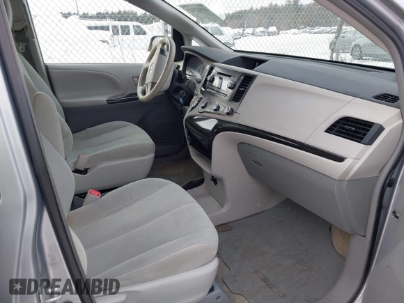 2012 Toyota Sienna with VIN 5TDKA3DC3CS010468, listed as a IAAI auction lot 41542523 with 56,055 mi miles and . Bid and sale history available at DreamBid. Image 5.