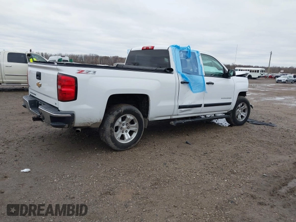 2014 Chevrolet Silverado 1500 LT with VIN 1GCVKREC2EZ390061, listed as a IAAI auction lot 40824477 with 140,928 mi miles and . Bid and sale history available at DreamBid. Image 4.