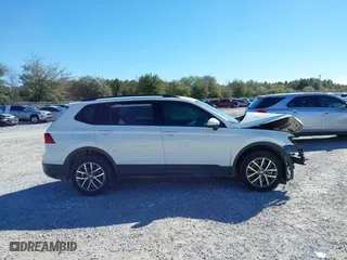 2021 Volkswagen Tiguan S with VIN 3VV1B7AX9MM056025, listed as a IAAI auction lot 41352521 with 98,944 mi miles. Bid and sale history available at carsss.com. Image 13.