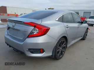 2019 Honda Civic Sport with VIN 19XFC2F8XKE015898, listed as a IAAI auction lot 41431062 with 108,071 mi miles and . Bid and sale history available at DreamBid. Image 4.