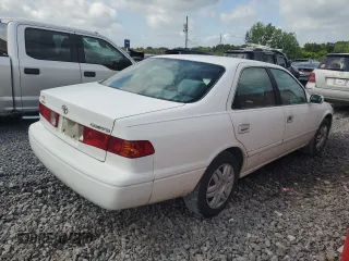 2000 Toyota Camry CE z VIN 4T1BG22K5YU936033, wystawiony jako Copart lot #57636215 z przebiegiem 242 889 mil mil oraz Szkoda całkowita • Salvage title. Historia ofert i sprzedaży dostępna na DreamBid. Obrazek 3.