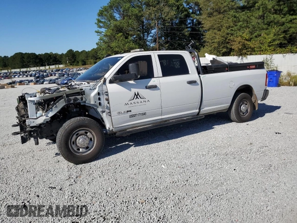 2022 Ram 2500 Tradesman with VIN 3C6UR4HJ7NG200511, listed as a Copart auction lot 73597674 with 105,042 mi miles and Salvage title. Bid and sale history available at DreamBid. Image 1.