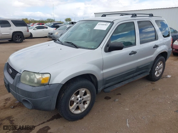 2005 Ford Escape XLT with VIN 1FMYU03175KA91500, listed as a IAAI auction lot 41958585 with 169,824 mi miles. Bid and sale history available at carsss.com. Image 2.