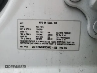2021 Tesla Model Y Long Range with VIN 5YJYGDEE3MF214823, listed as a Copart auction lot 50738045 with 63,227 mi miles and Salvage Title. Bid and sale history available at DreamBid. Image 13.