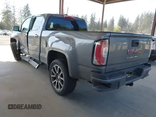 2021 GMC Canyon 4WD Denali with VIN 1GTG6EEN5M1102747, listed as a IAAI auction lot 42121134 with 60,412 mi miles and . Bid and sale history available at carsss.com. Image 3.