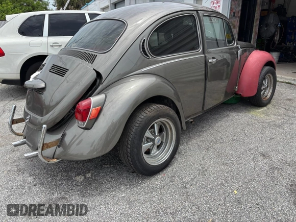 1971 Volkswagen Beetle with VIN 1112225516, listed as a Copart auction lot 64374845 with 84,201 mi miles and Salvage title. Bid and sale history available at DreamBid. Image 4.