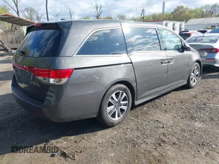 2015 Honda Odyssey Touring Elite with VIN 5FNRL5H99FB094727, listed as a IAAI auction lot 42001288 with 254,015 mi miles and . Bid and sale history available at DreamBid. Image 4.