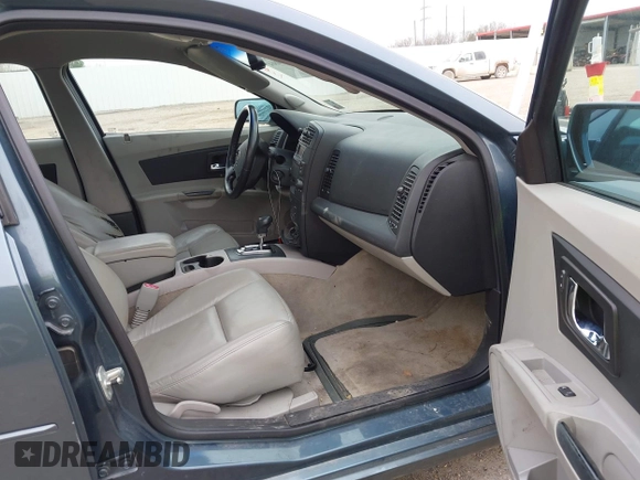 2006 Cadillac CTS with VIN 1G6DM57T160185772, listed as a IAAI auction lot 41564864 with 91,487 mi miles. Bid and sale history available at carsss.com. Image 5.