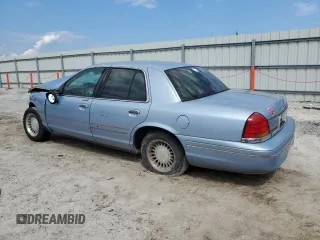 1998 Ford Crown Victoria LX с VIN 2FAFP74W3WX162752, выставлен на аукционе Copart как лот 72498904 с пробегом Не указан миль и Списание • Salvage title. История ставок и продаж доступна на DreamBid. Изображение 2.