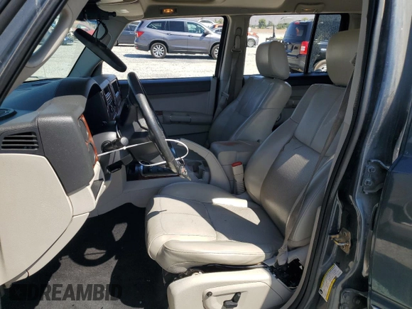 2007 Jeep Commander Limited with VIN 1J8HH58NX7C673663, listed as a Copart auction lot 69526944 with 146,191 mi miles and Salvage title. Bid and sale history available at DreamBid. Image 7.