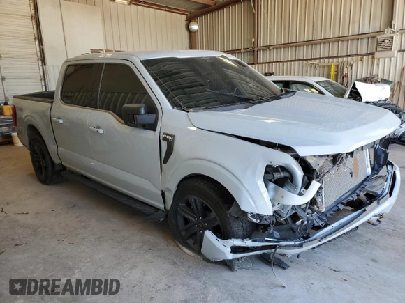 2023 Ford F-150 XL with VIN 1FTFW1E88PFD22387, listed as a Copart auction lot 49795405 with 14,057 mi miles and Salvage Title. Bid and sale history available at carsss.com. Image 4.